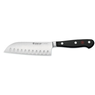 Wusthof Classic santoku knife with hollow edge 14 cm. black Buy now on Shopdecor